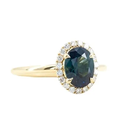 1.55ct Oval Blue Nigerian Sapphire and Diamond Four Prong Halo Ring in 14k Yellow Gold