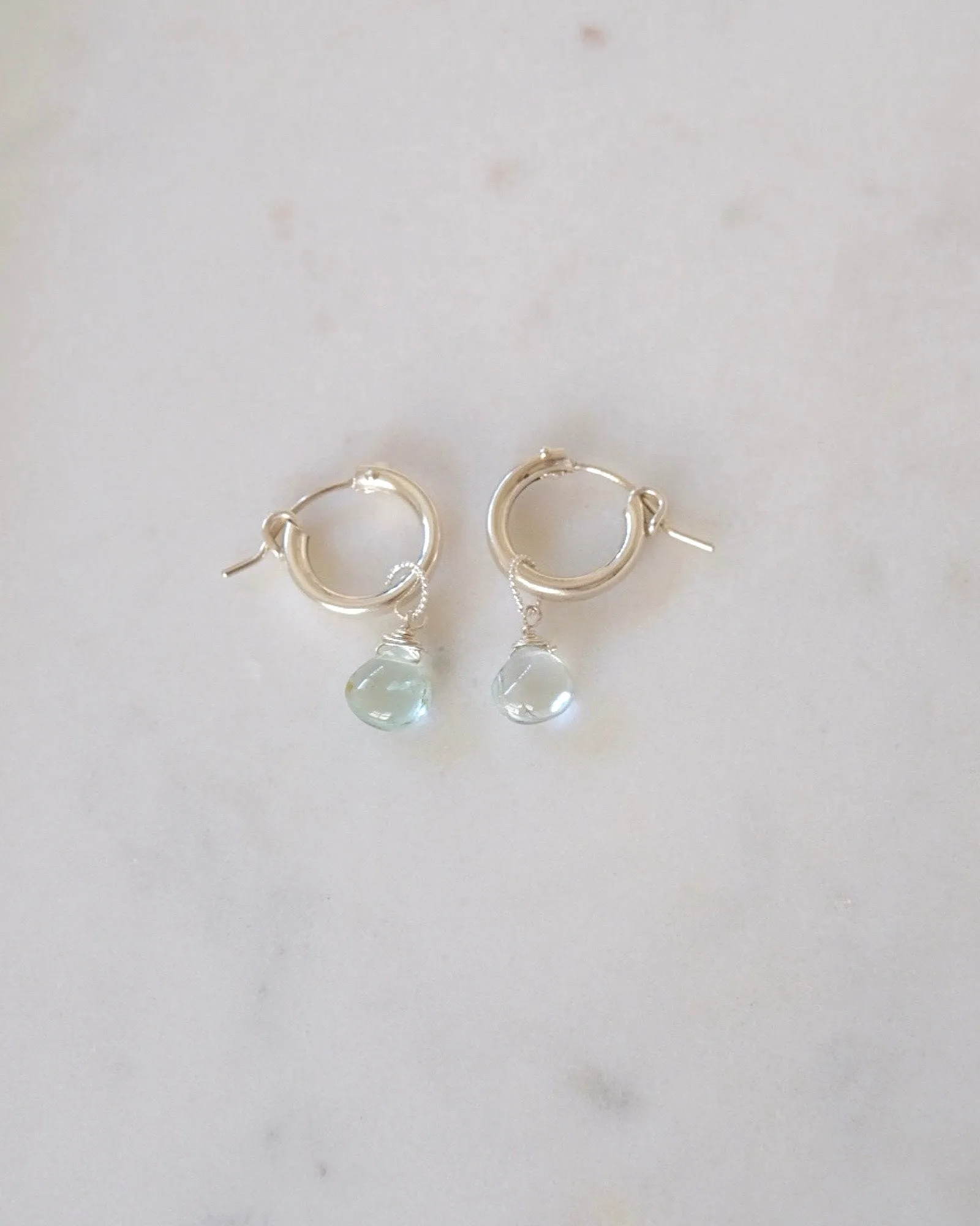 Aquamarine huggie hoop earrings