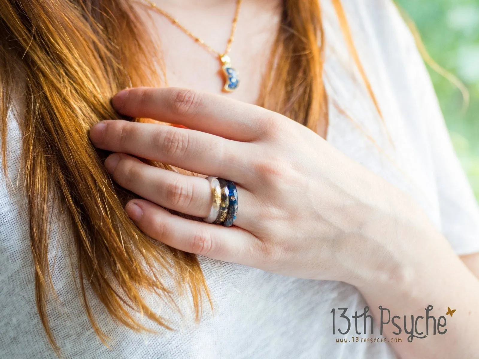 Black faceted resin ring with gold flakes